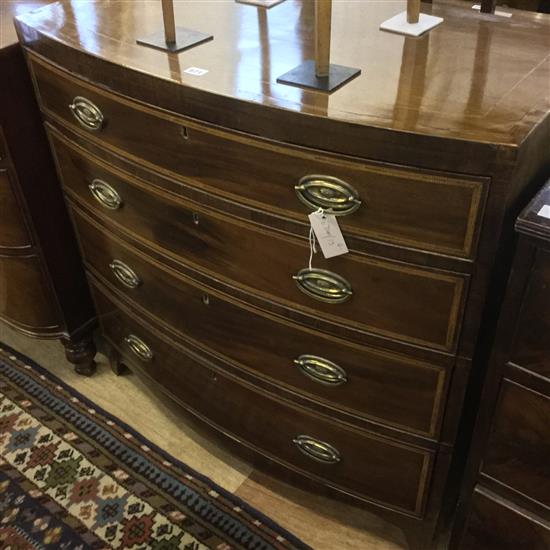 Early 19C mahogany bow-fronted four-drawer chest, on  bracket feet